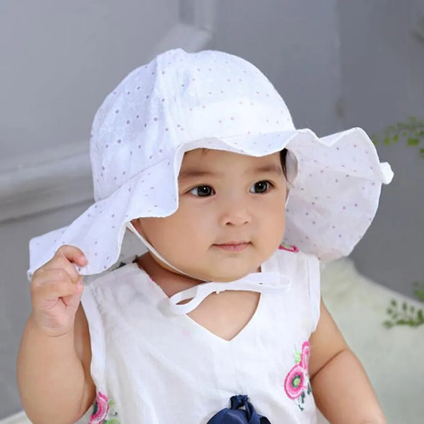 Kids Sun Hat | Polka Dot Floral - Kids Hats - Poshinate Kiddos Baby & Kids Store - Child wearing white Polka Dot Hat with strap